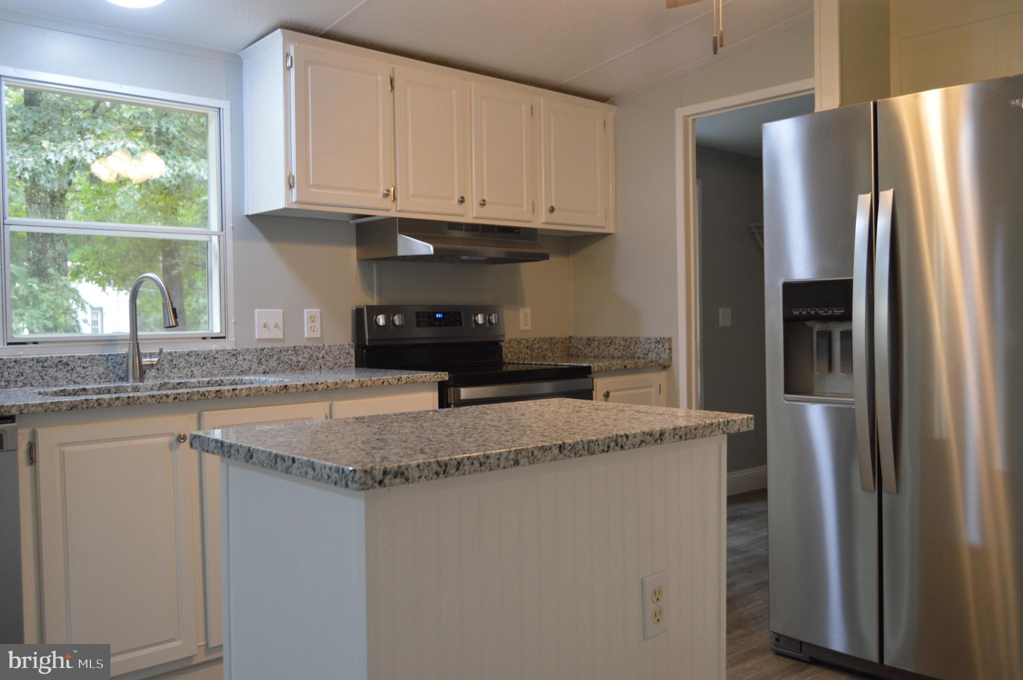 19286 Courtney Road Hanover, VA 23069 - Photo 9 of 23 Plenty of cabinet space and work space