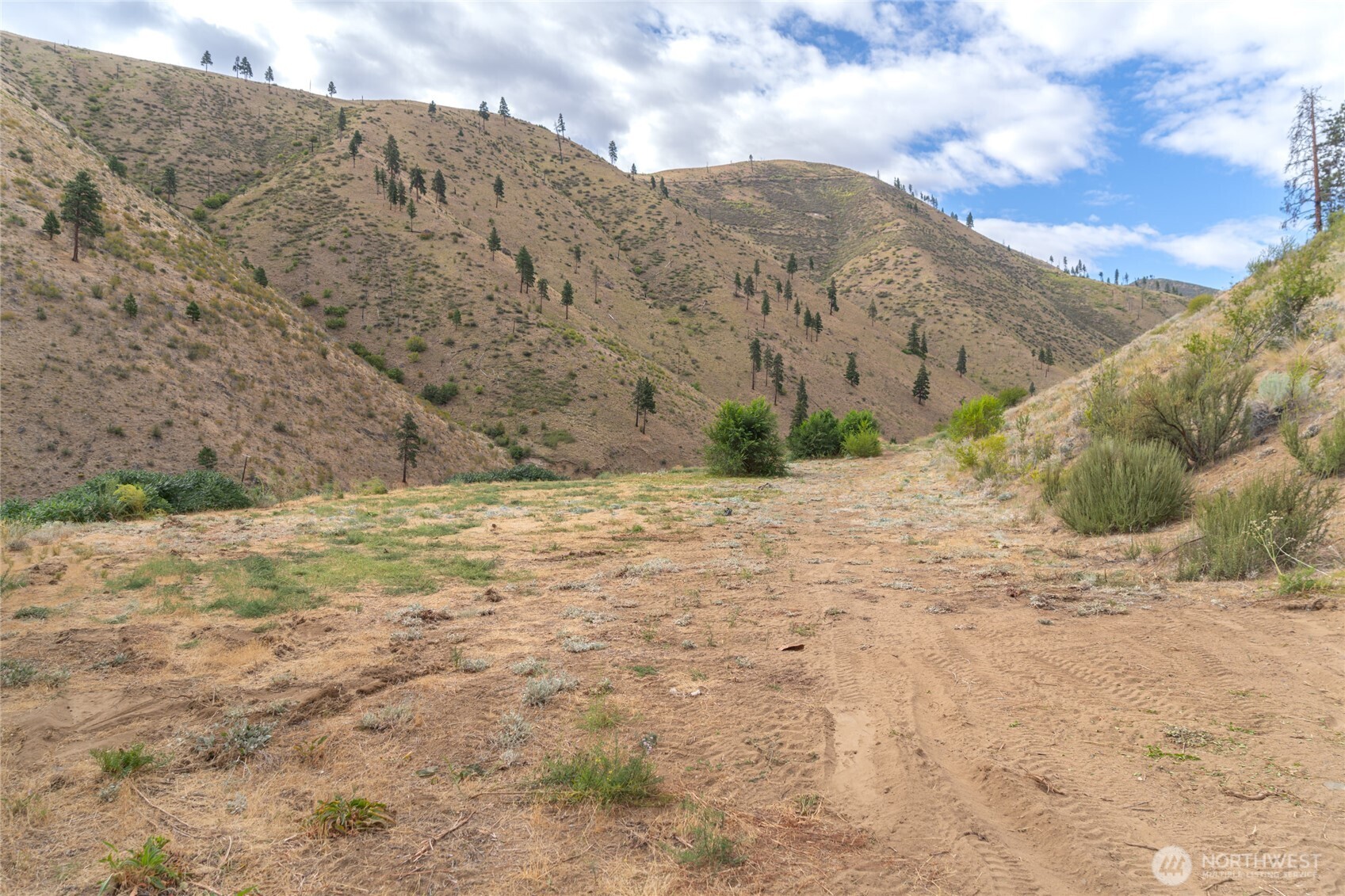 5058 Mills Canyon Road Entiat, WA 98822 - Photo 2 of 25 a view of mountain with wooden fence