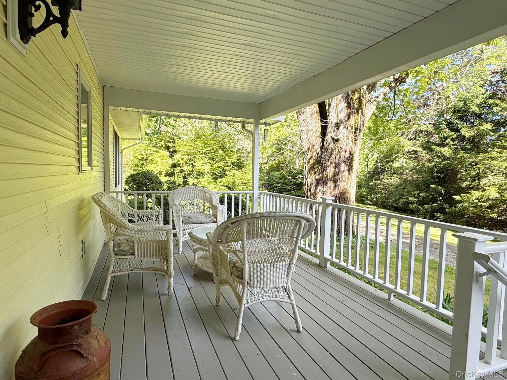 230 Cooper Road Millerton, NY 12546 - Photo 5 of 20 a view of a chairs and table in the balcony