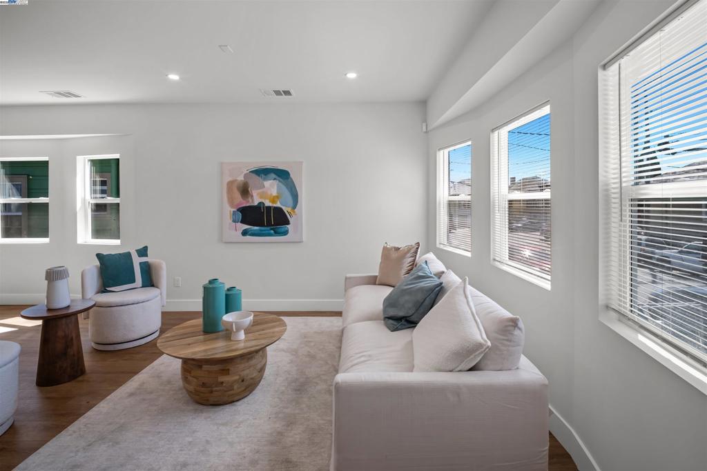 1562 Bridge Oakland, CA 94601 - Photo 3 of 32 a living room with furniture and a window