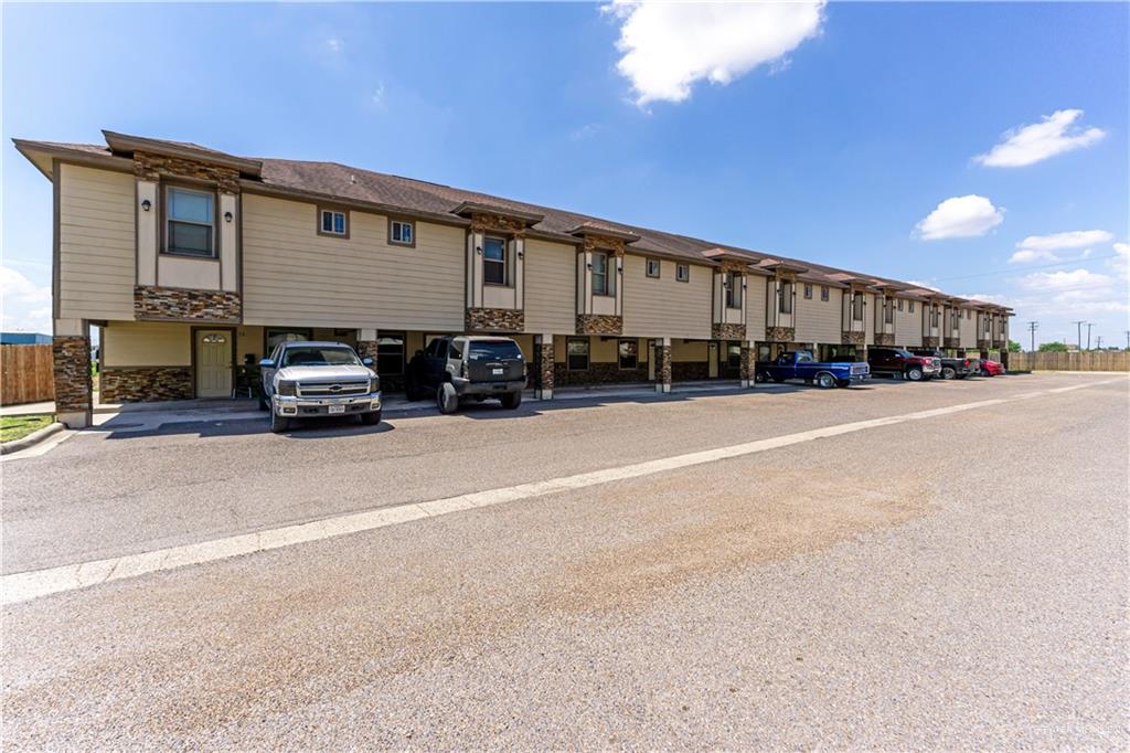 1500 Humming Bird Court, Unit 12 Pharr, TX 78577 - Photo 2 of 26 a view of a street with cars