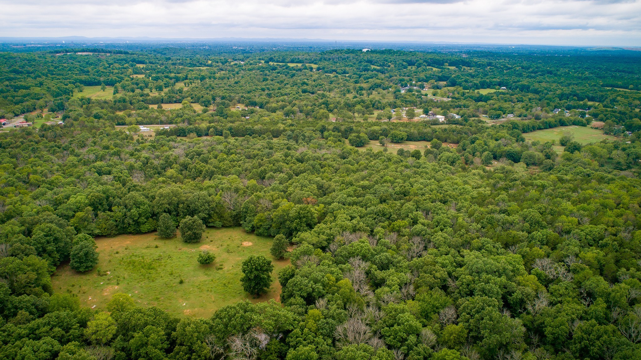 0 Factory Road Murfreesboro, TN 37130 - Photo 5 of 6 a view of a big yard with a garden and mountain view