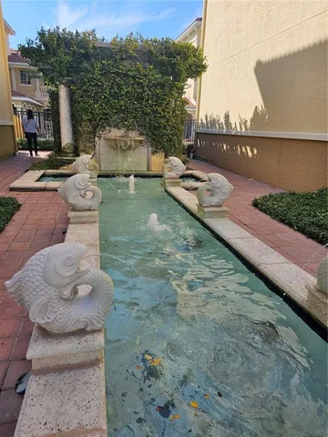 a view of a terrace with sitting area