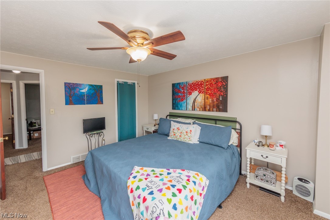 6476 State Road, Unit H8 Cleveland, OH 44134 - Photo 30 of 35 Carpeted bedroom featuring ceiling fan