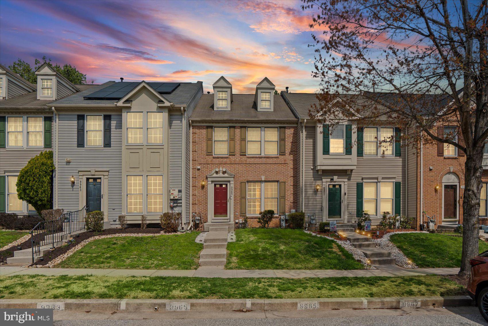 9965 Sherwood Farm Road Owings Mills, MD 21117 - Photo 1 of 35 a front view of a house with a yard