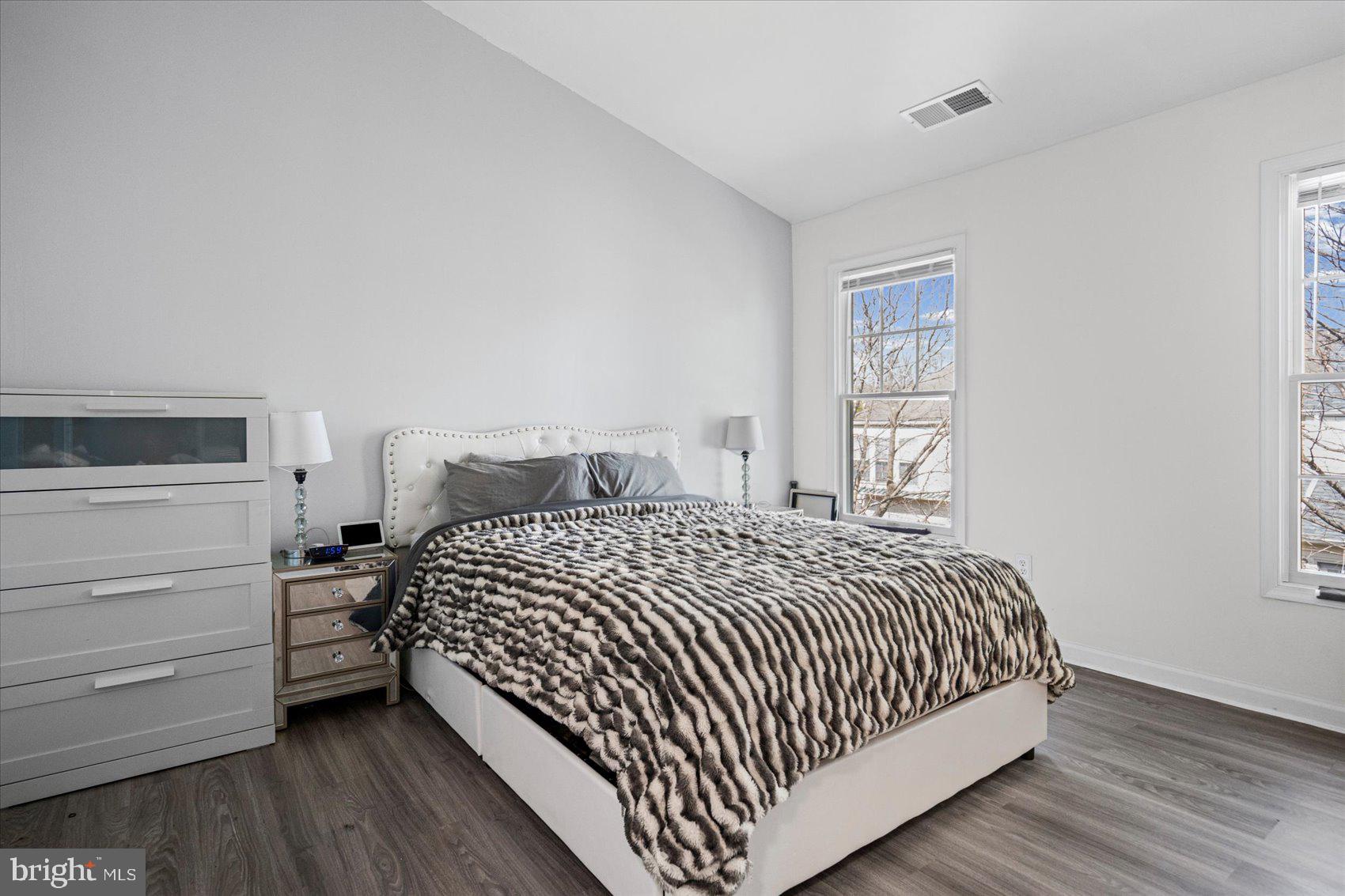 9965 Sherwood Farm Road Owings Mills, MD 21117 - Photo 13 of 35 a bedroom with a bed and a window