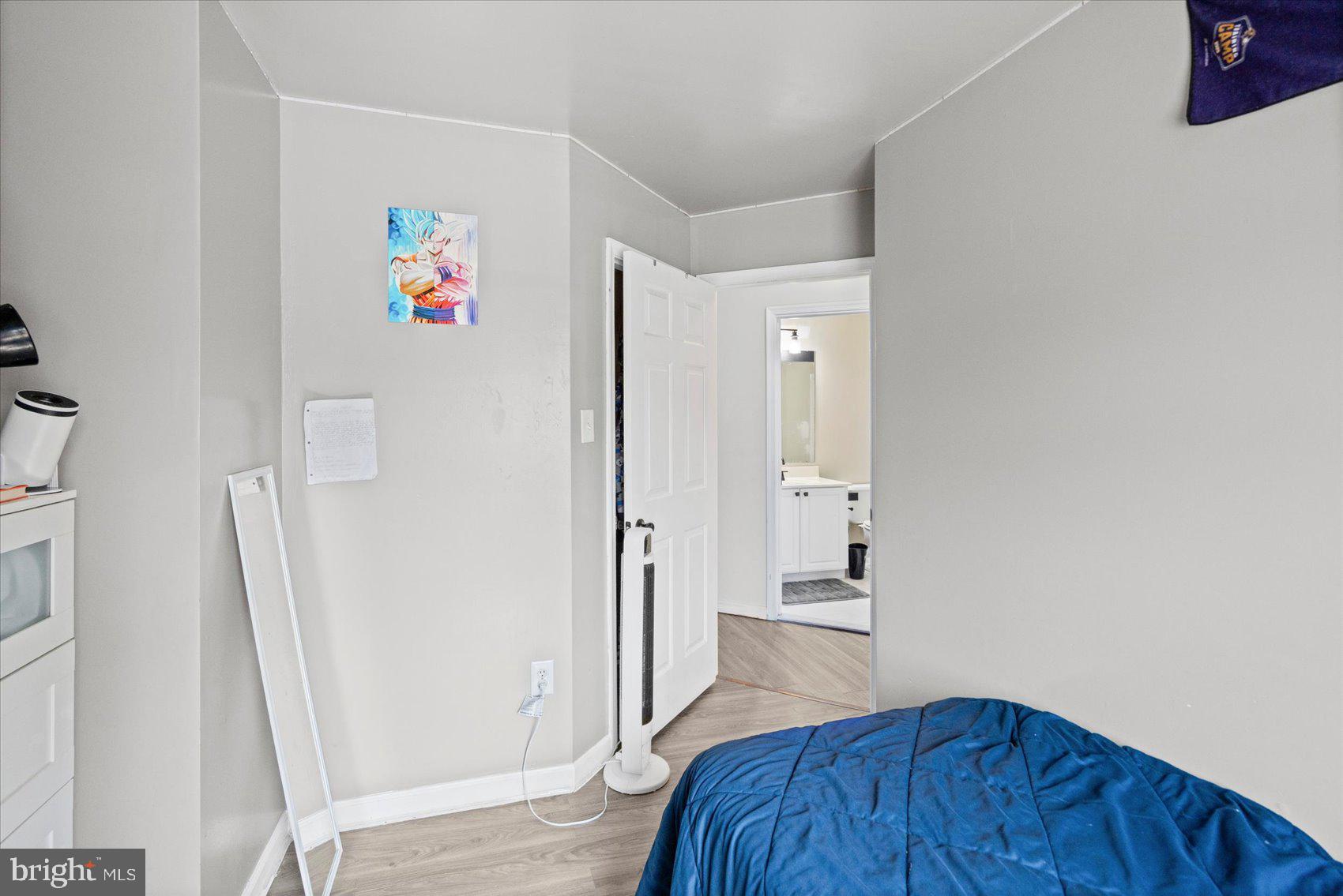 9965 Sherwood Farm Road Owings Mills, MD 21117 - Photo 19 of 35 wooden floor in a white room