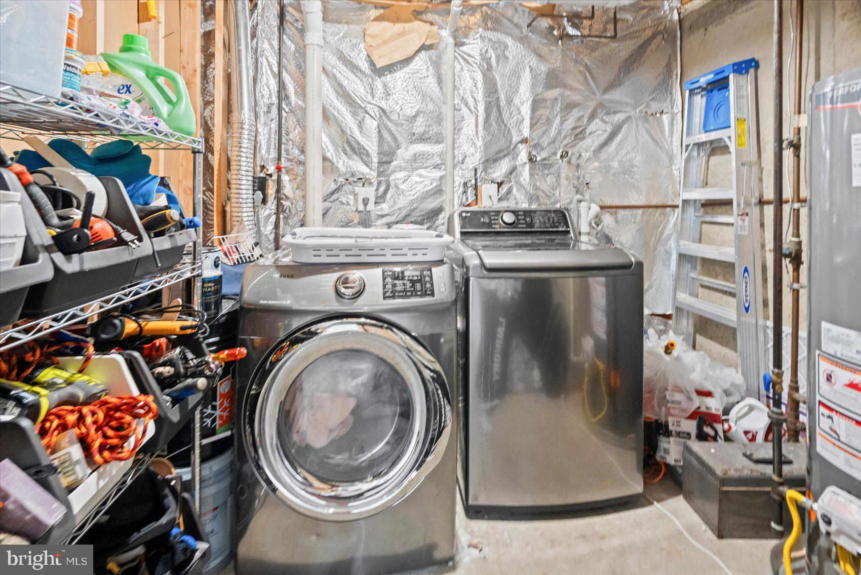9965 Sherwood Farm Road Owings Mills, MD 21117 - Photo 23 of 35 a utility room with dryer and washer