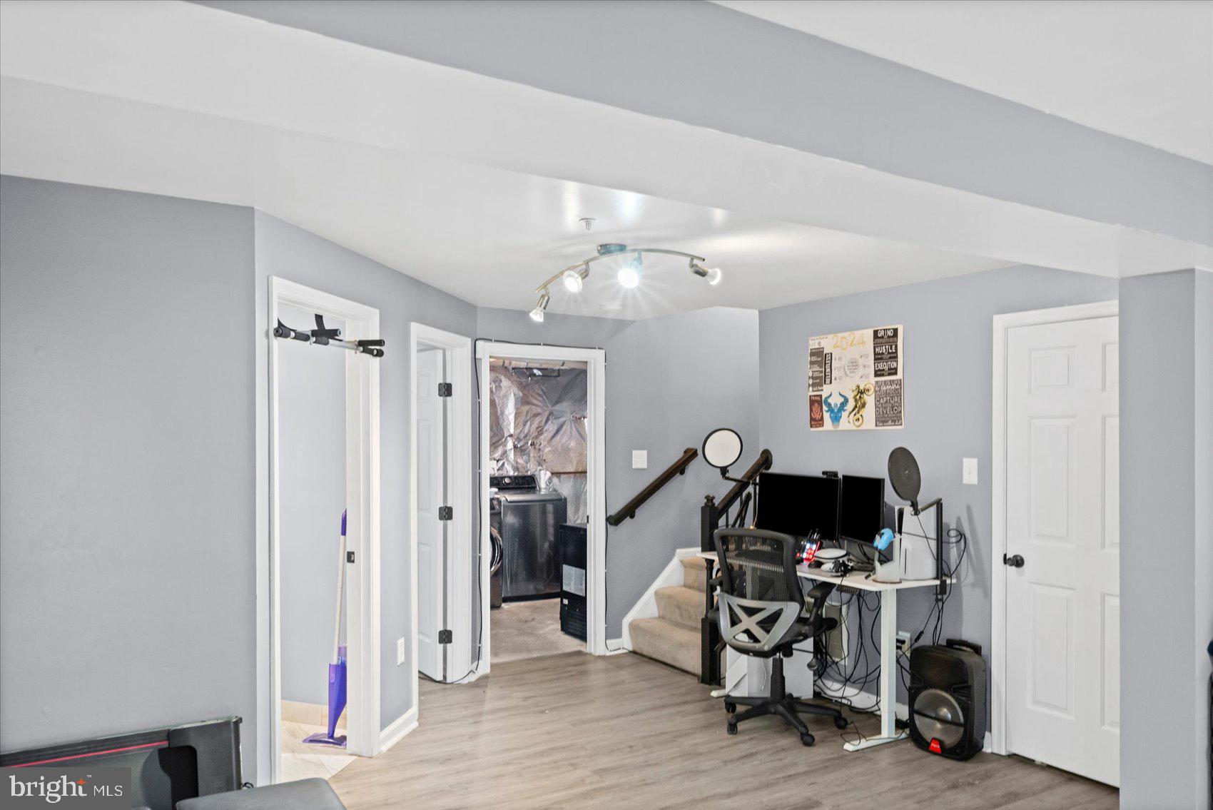 9965 Sherwood Farm Road Owings Mills, MD 21117 - Photo 25 of 35 a view of a livingroom with gym equipment