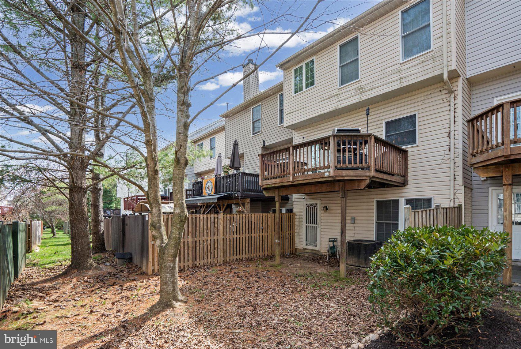 9965 Sherwood Farm Road Owings Mills, MD 21117 - Photo 27 of 35 a view of a house with a yard