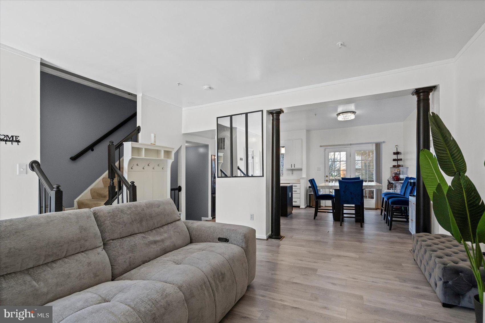 9965 Sherwood Farm Road Owings Mills, MD 21117 - Photo 3 of 35 a living room with furniture and a flat screen tv