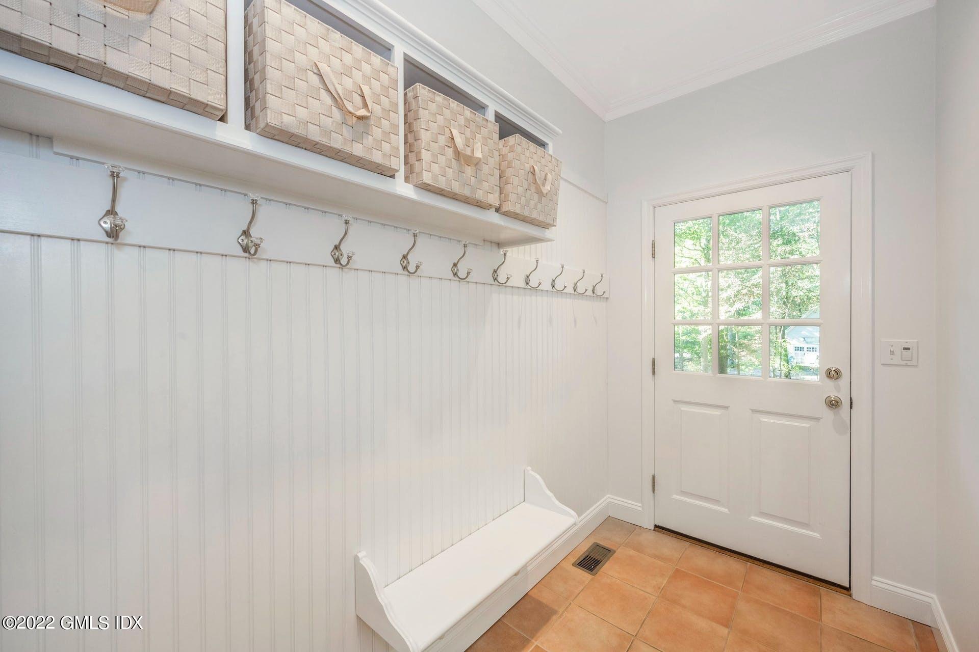 12 Frontier Road Cos Cob, CT 06807 - Photo 23 of 36 a view of a room with rack on the wall