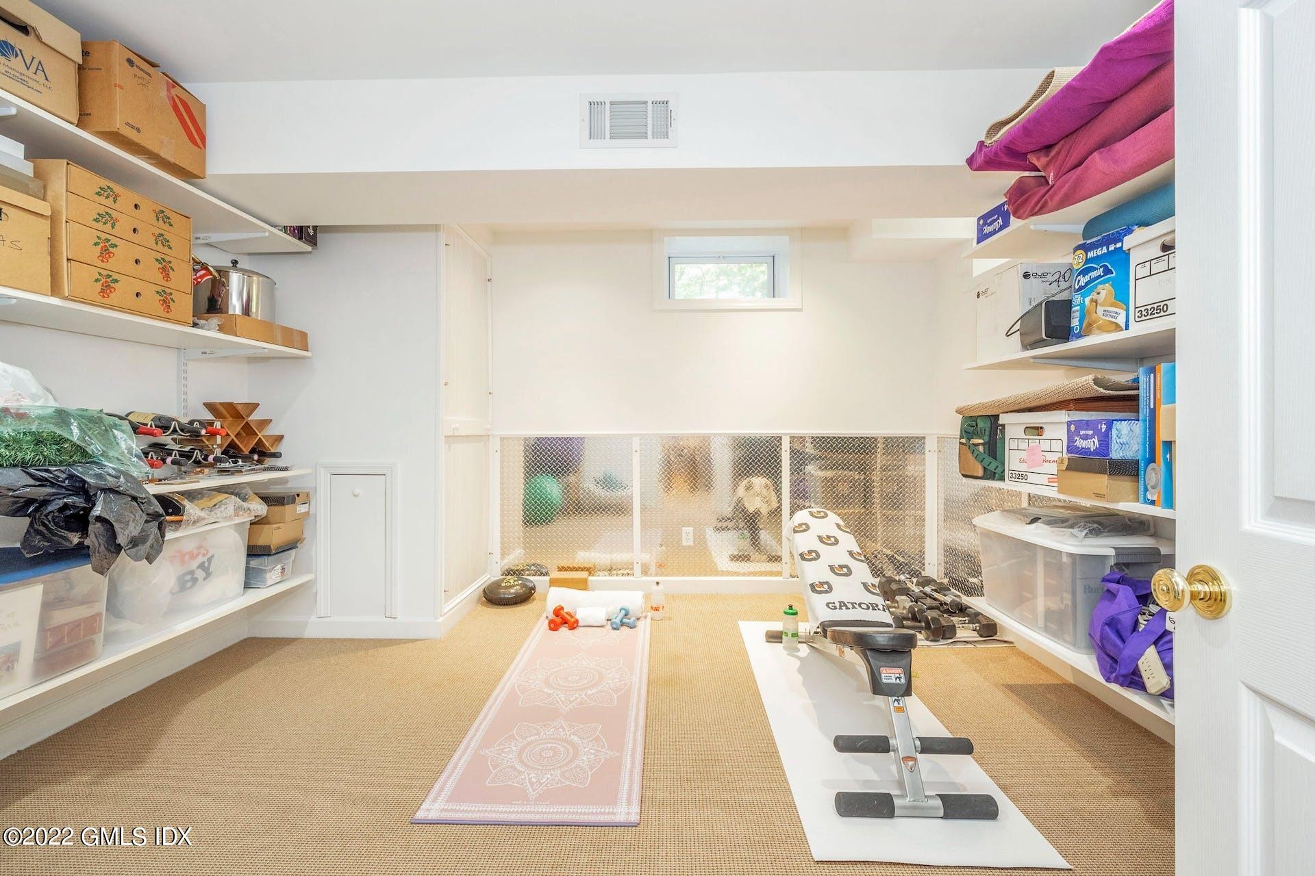 12 Frontier Road Cos Cob, CT 06807 - Photo 26 of 36 a living room with furniture and a potted plant