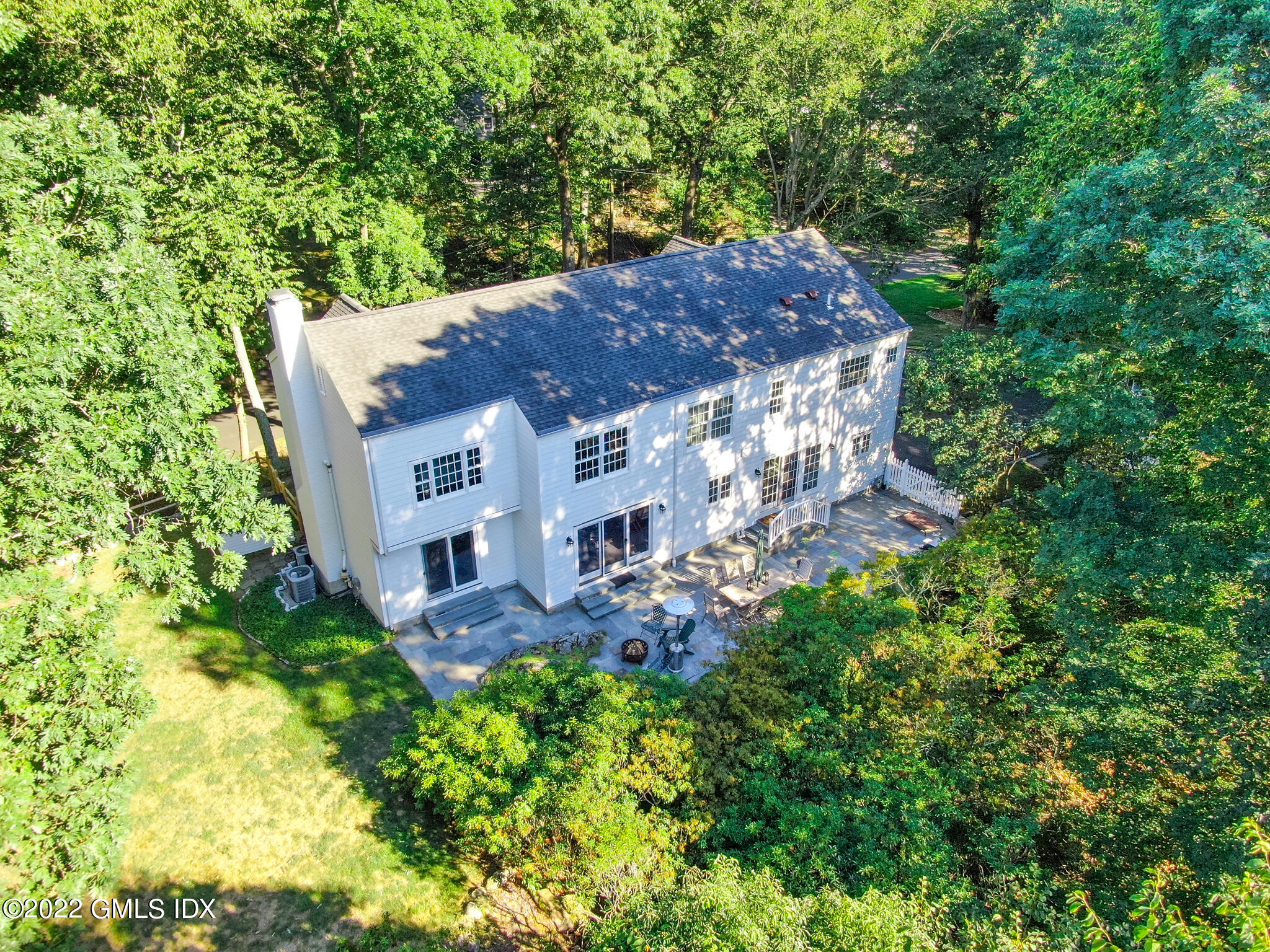 12 Frontier Road Cos Cob, CT 06807 - Photo 33 of 36 a view of a big yard with plants and large trees