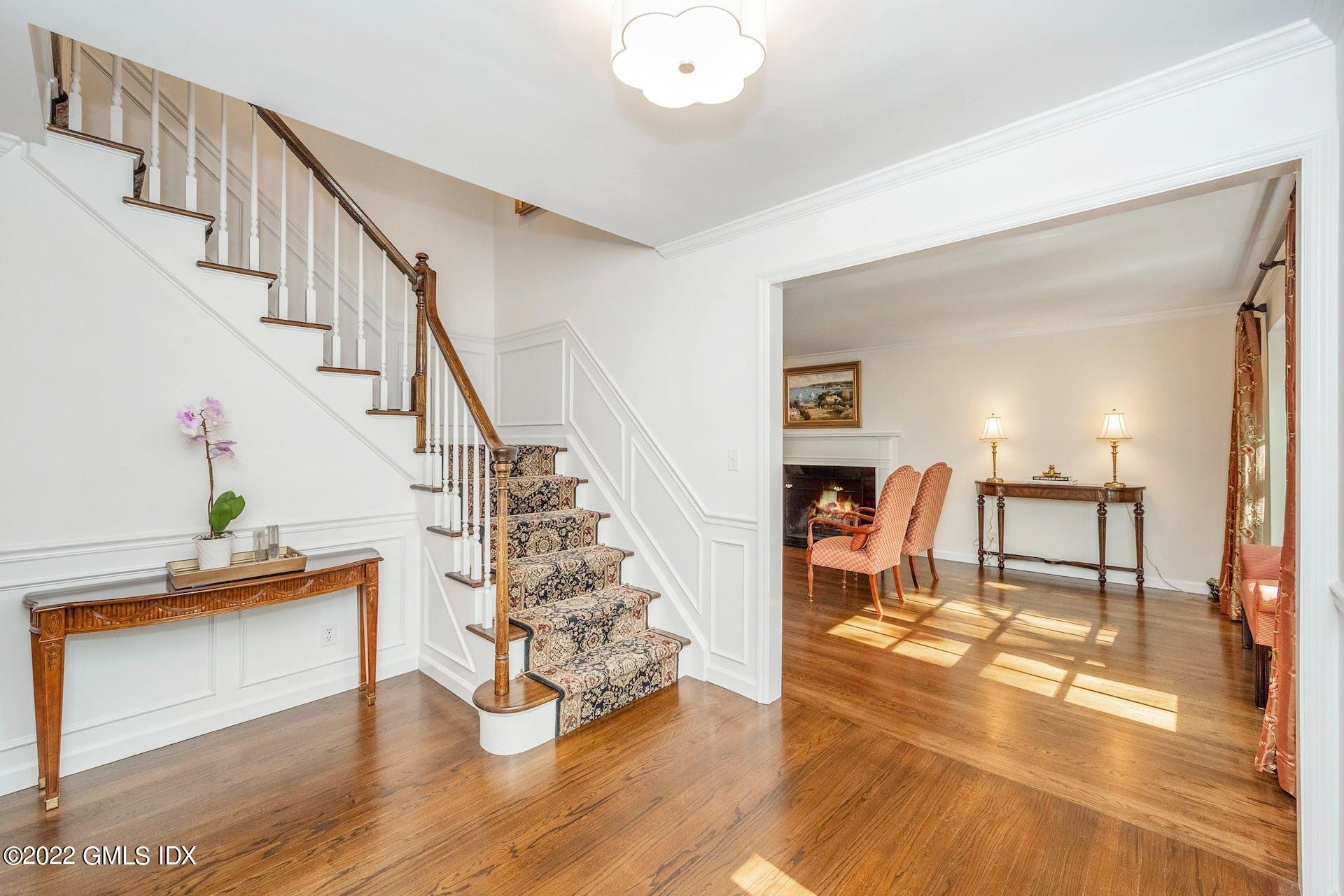 12 Frontier Road Cos Cob, CT 06807 - Photo 4 of 36 a view of entryway and hall with wooden floor