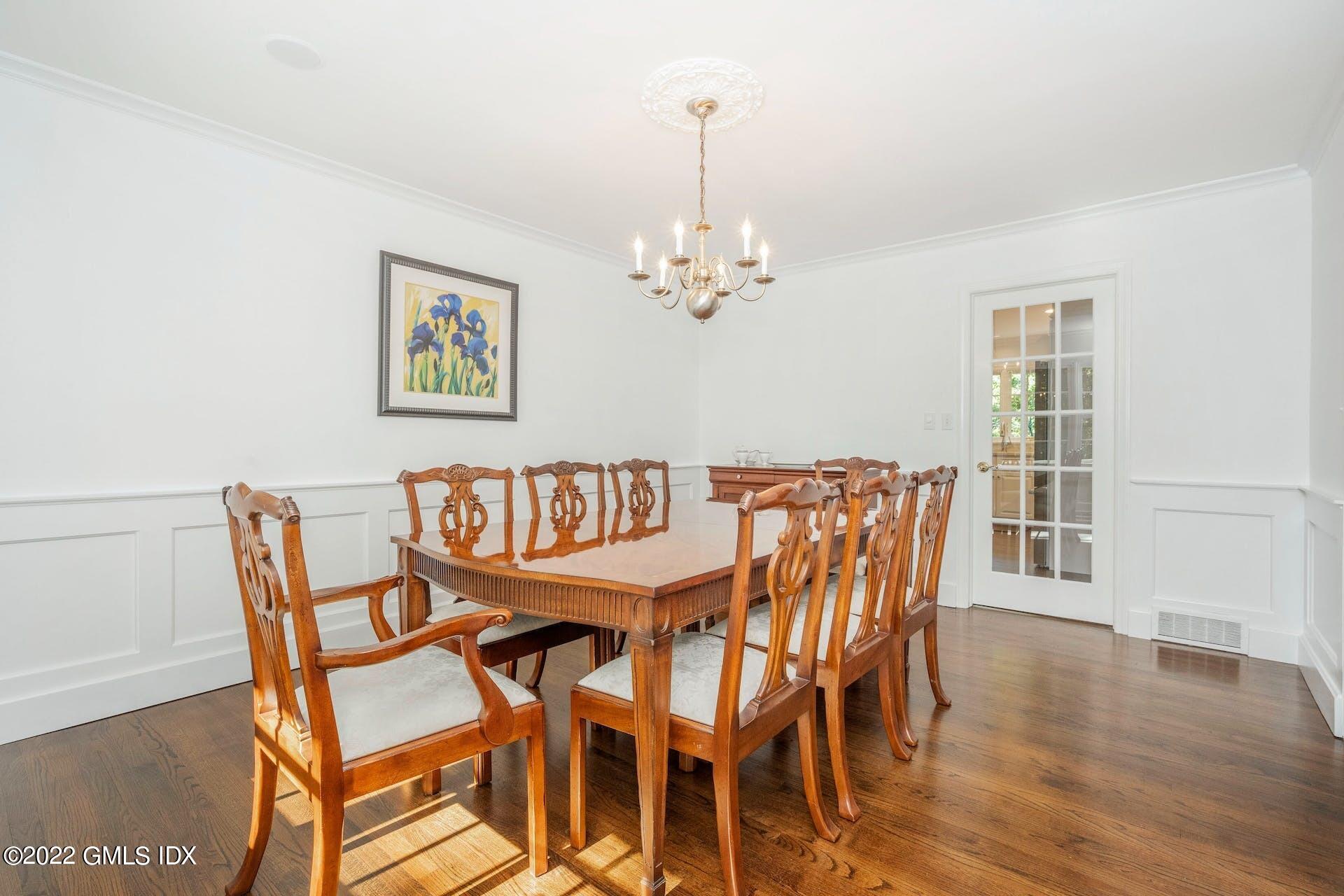 12 Frontier Road Cos Cob, CT 06807 - Photo 8 of 36 a dining room with furniture and wooden floor