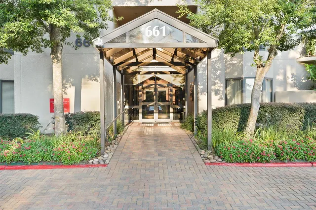 a view of a garden with pathway