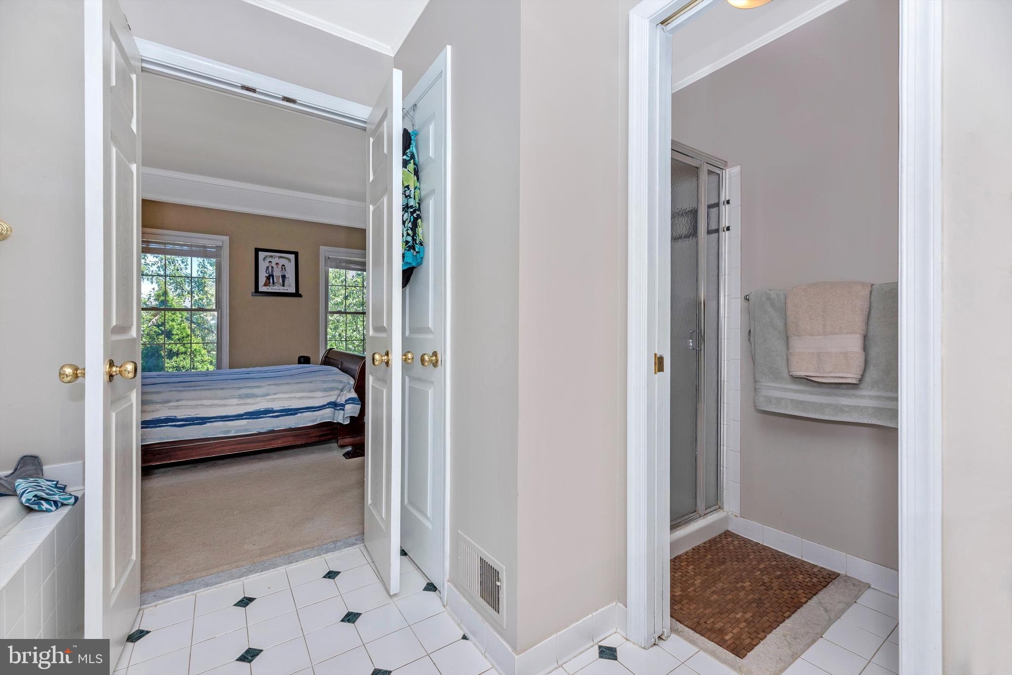 2220 Bear Den Road Frederick, MD 21701 - Photo 29 of 54 a view of bathroom with a tub and shower