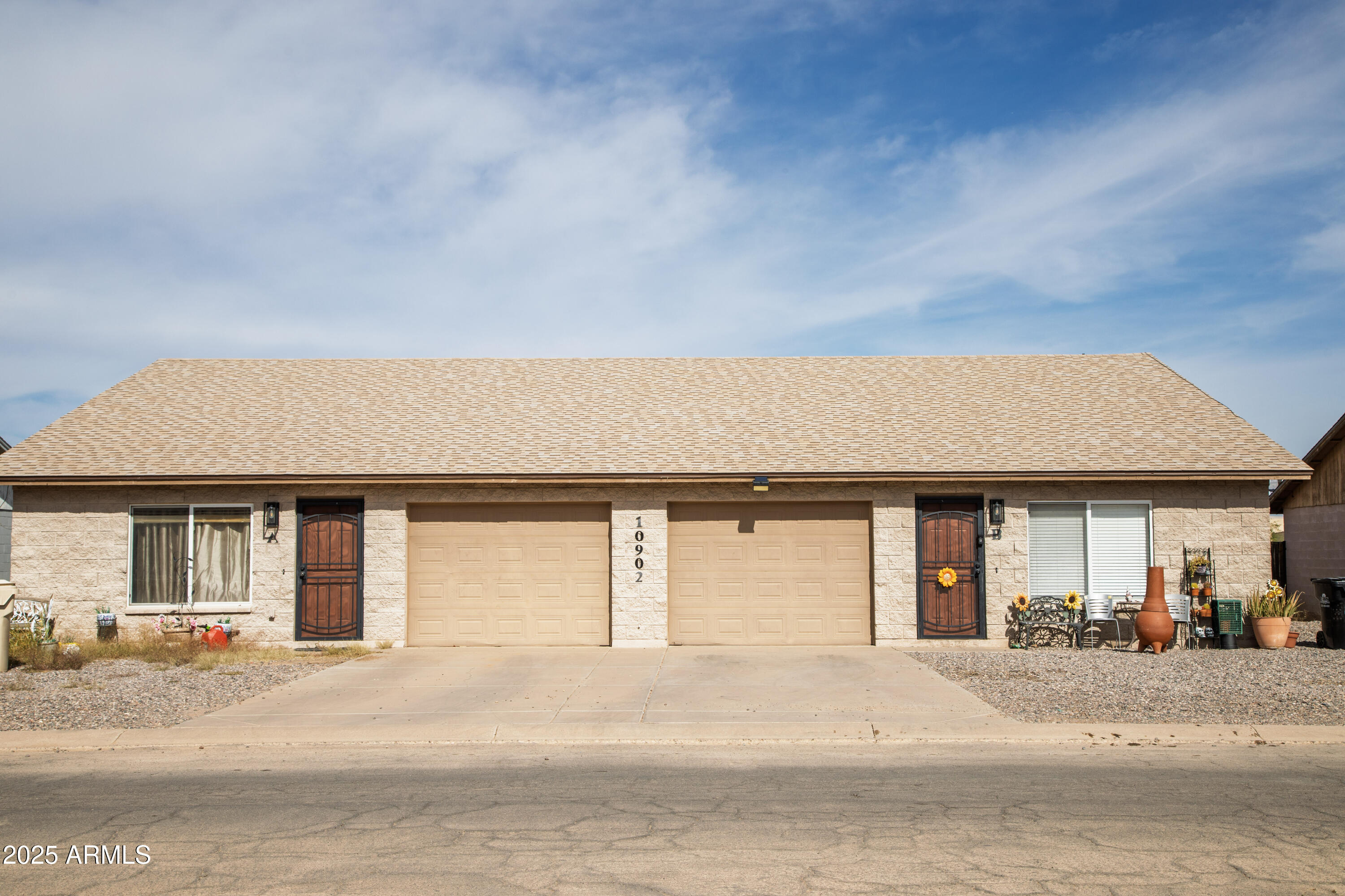 front view of a house with a barbeque