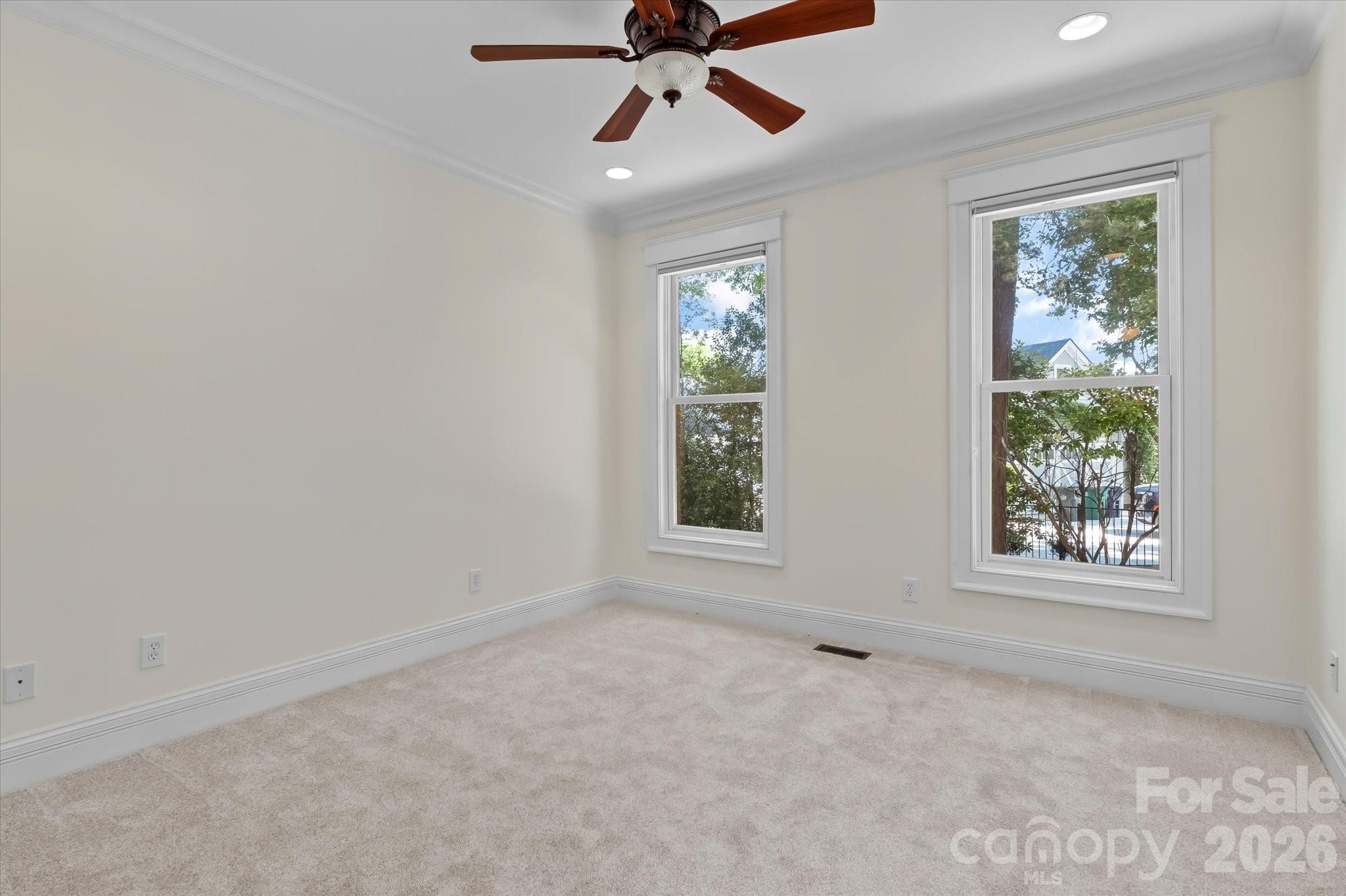 17821 Carlow Road Cornelius, NC 28031 - Photo 19 of 45 a view of an empty room with a window