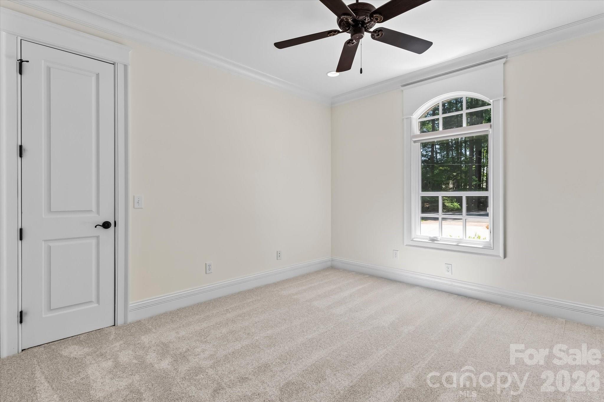 17821 Carlow Road Cornelius, NC 28031 - Photo 22 of 45 a view of an empty room with a window