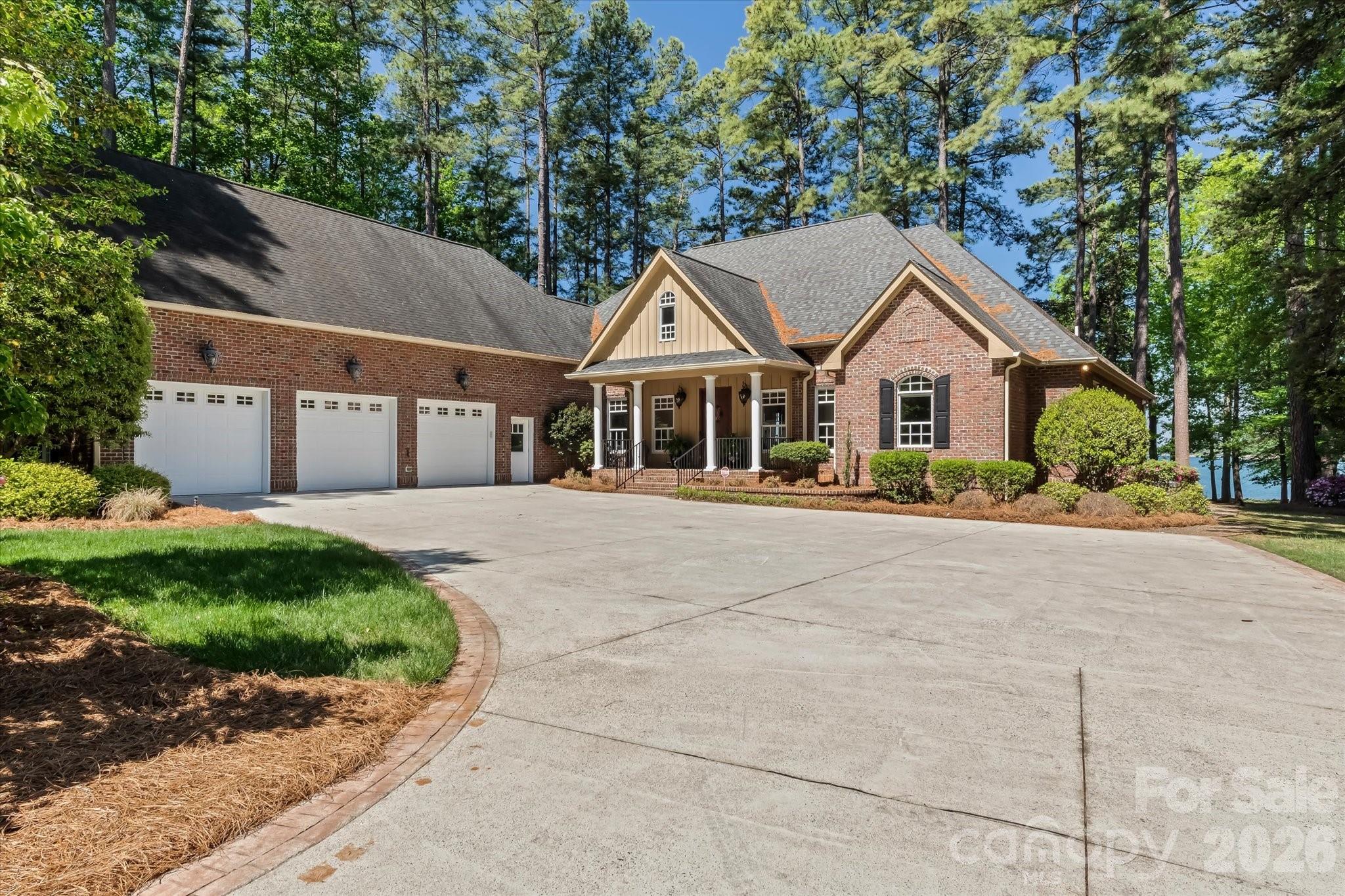 17821 Carlow Road Cornelius, NC 28031 - Photo 3 of 45 a front view of a house with a garden