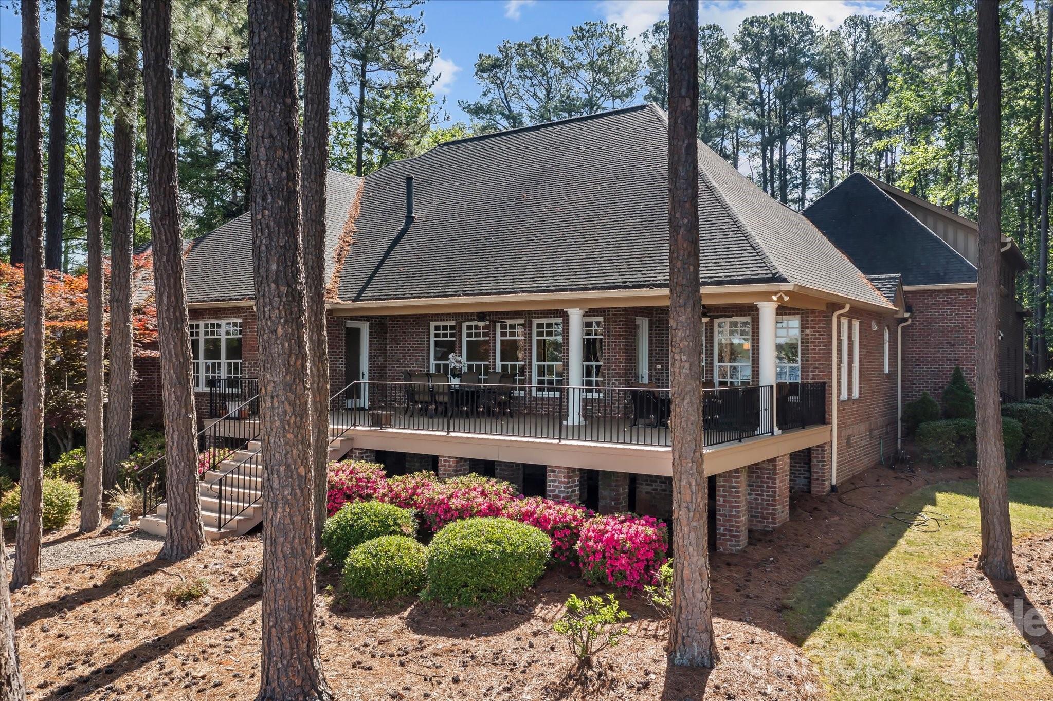 17821 Carlow Road Cornelius, NC 28031 - Photo 45 of 45 a front view of a house with a garden