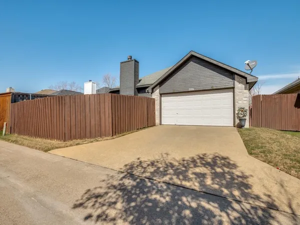 a view of backyard of house