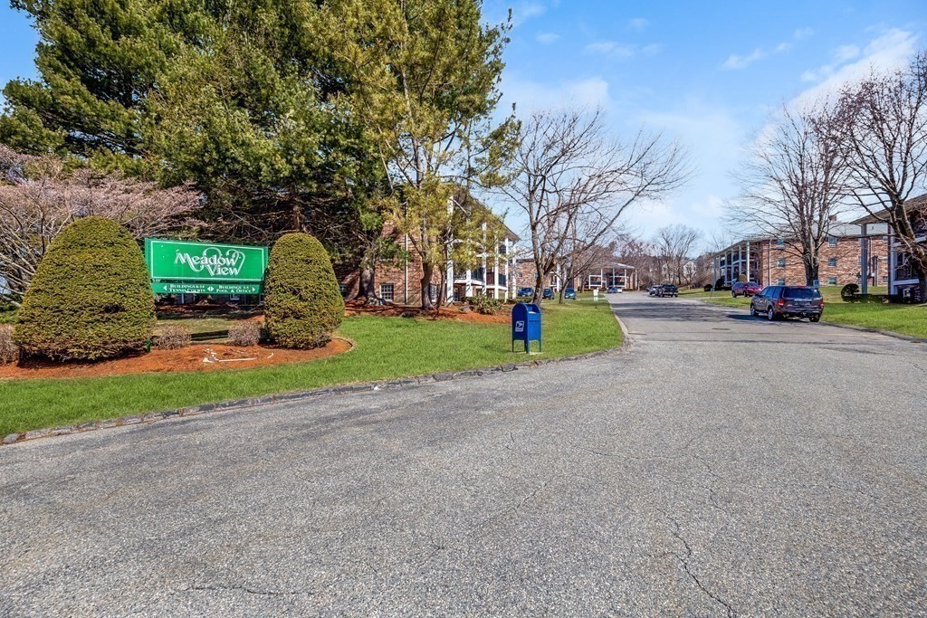 14 Walker Road, Unit 6 North Andover, MA 01845 - Photo 2 of 21 a childrens park with lots of swings and slides
