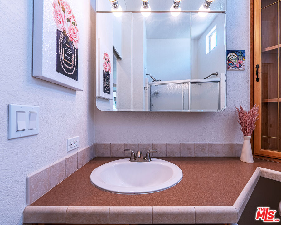 70200 Dillon Road, Unit 581 Desert Hot Springs, CA 92241 - Photo 14 of 23 a living room with furniture