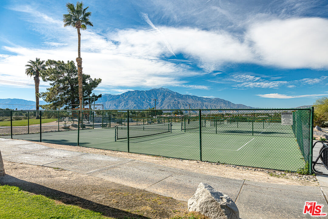 70200 Dillon Road, Unit 581 Desert Hot Springs, CA 92241 - Photo 22 of 23 a view of a backyard