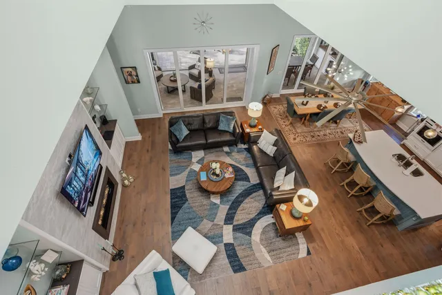 an aerial view of residential houses with outdoor space