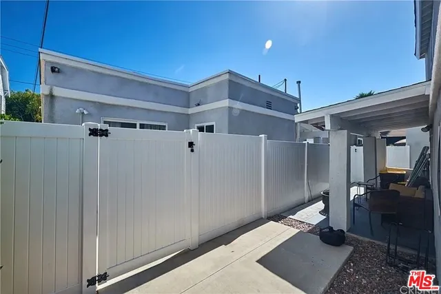 a kitchen with stainless steel appliances granite countertop a stove and a refrigerator