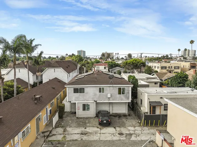 a view of a city in front of house