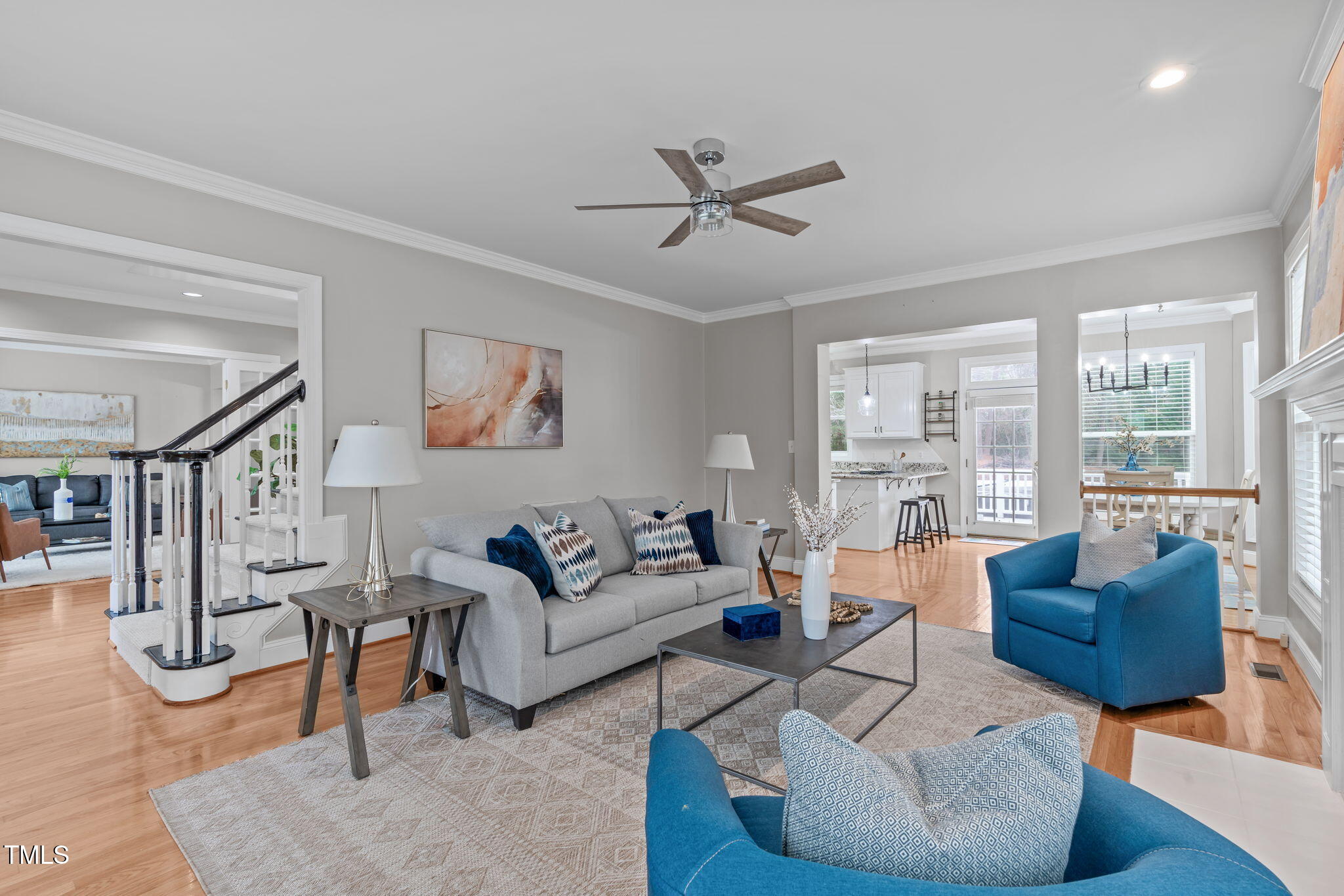 6016 Heatherstone Drive Raleigh, NC 27606 - Photo 10 of 40 a living room with furniture and a large window