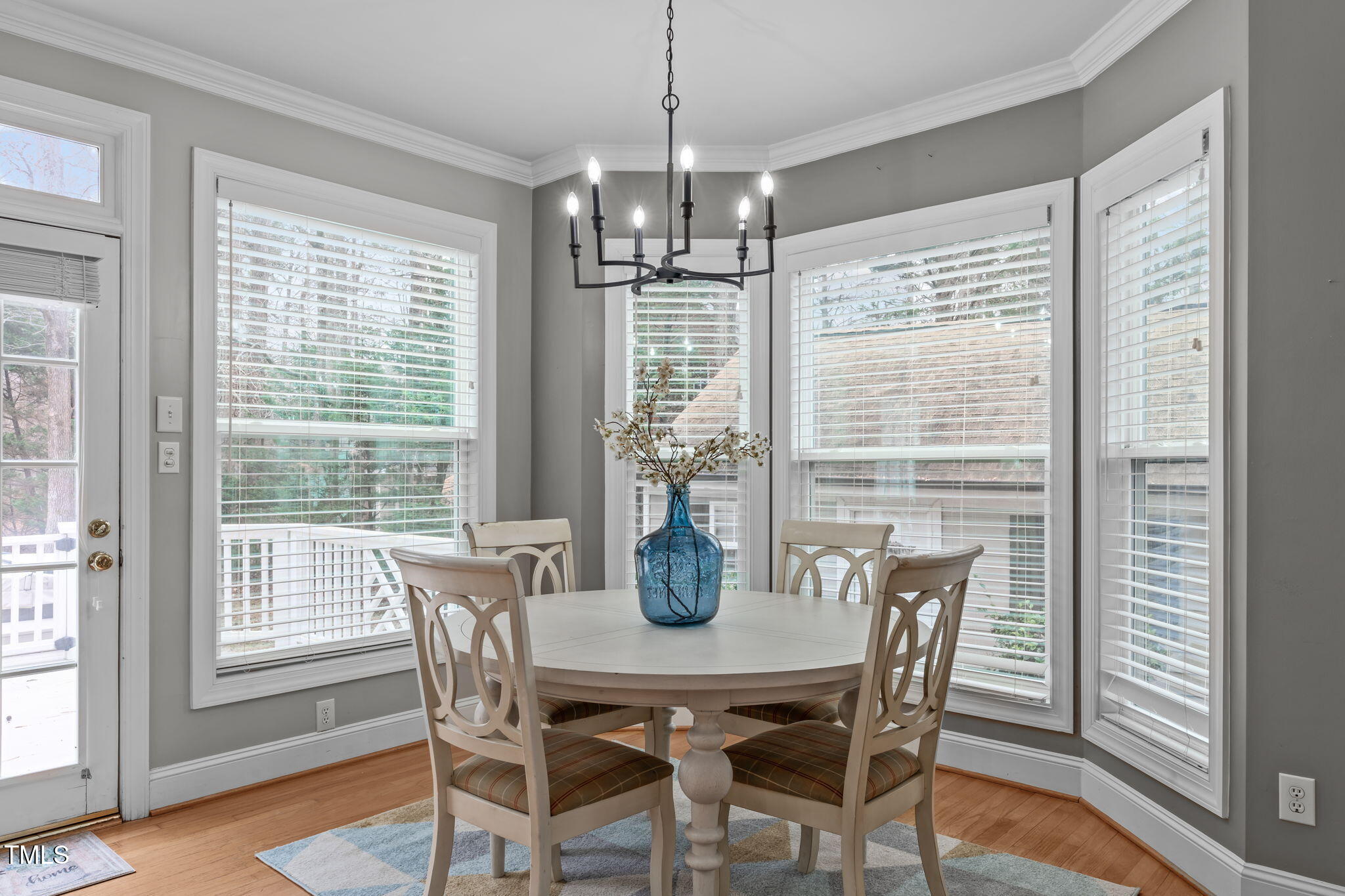 6016 Heatherstone Drive Raleigh, NC 27606 - Photo 14 of 40 a view of a dining room with furniture window and outside view