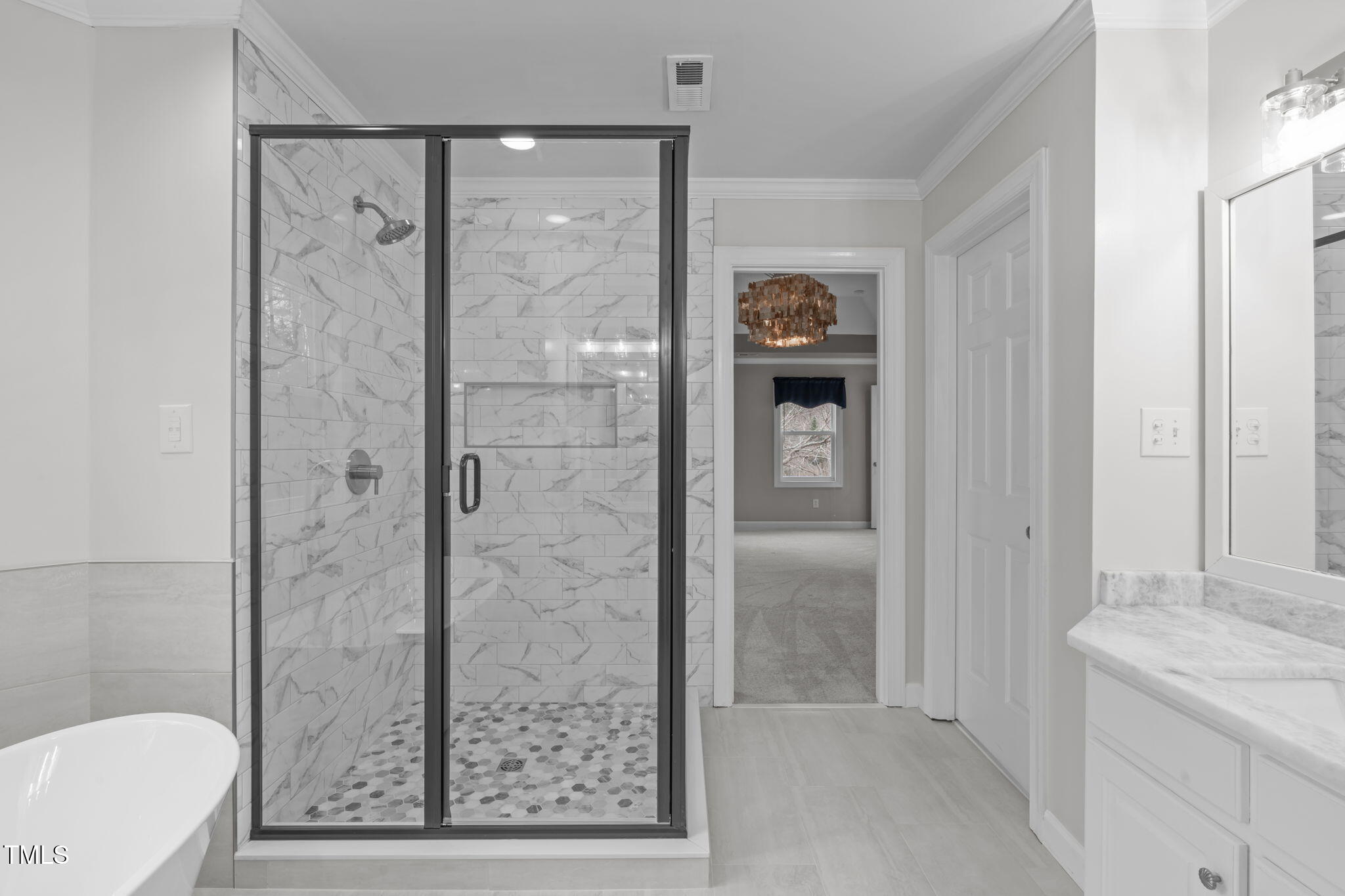 6016 Heatherstone Drive Raleigh, NC 27606 - Photo 21 of 40 a bathroom with a shower and a sink