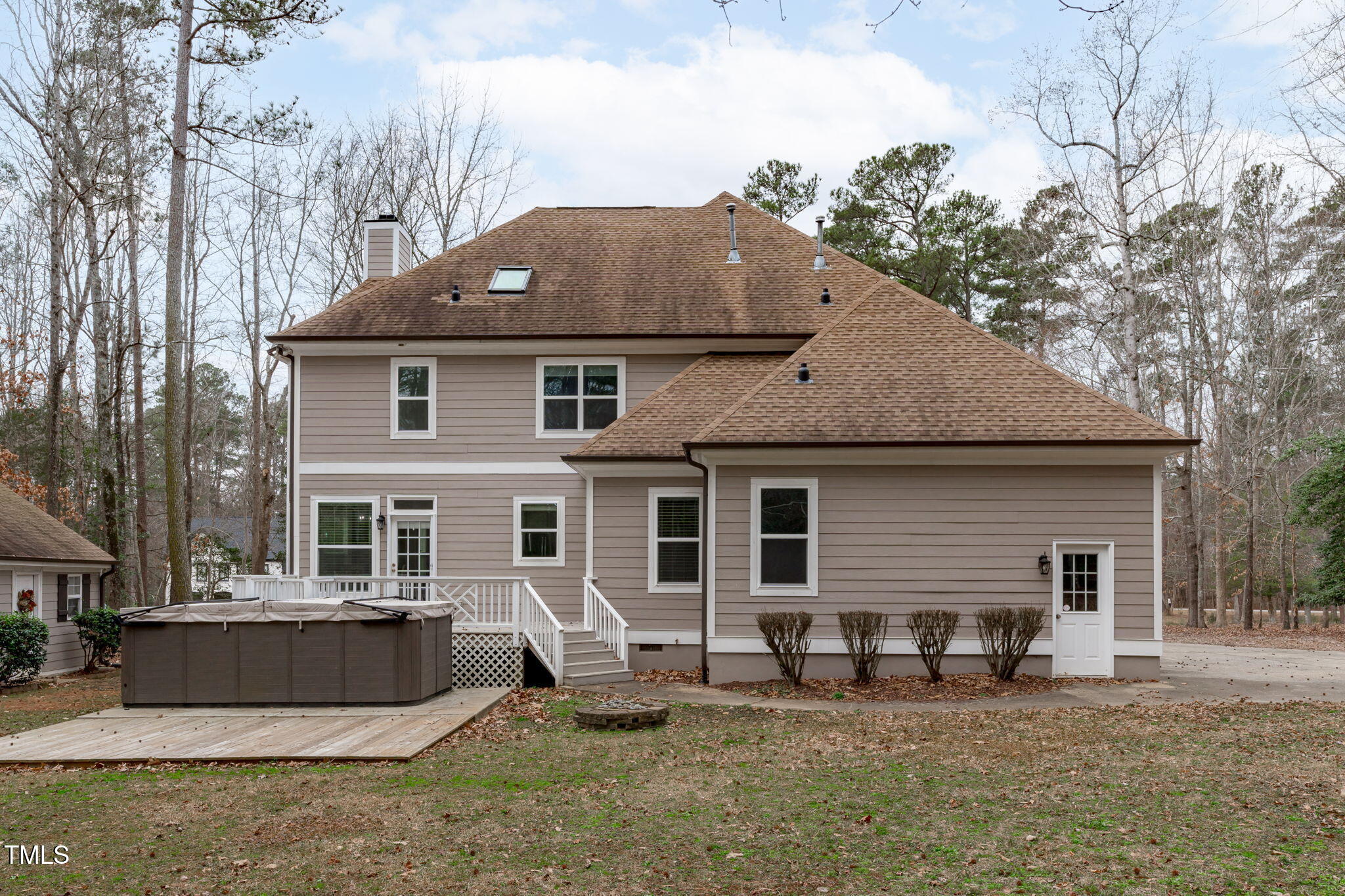 6016 Heatherstone Drive Raleigh, NC 27606 - Photo 35 of 40 a front view of a house with patio