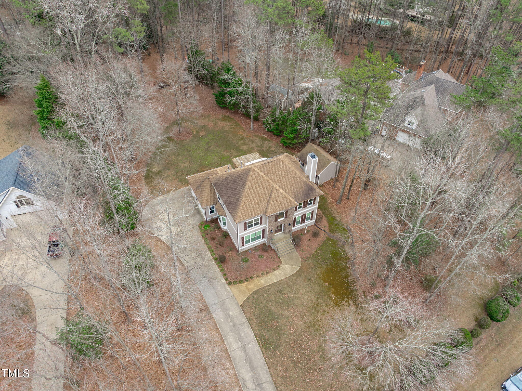 6016 Heatherstone Drive Raleigh, NC 27606 - Photo 39 of 40 an aerial view of a house with yard and lake view