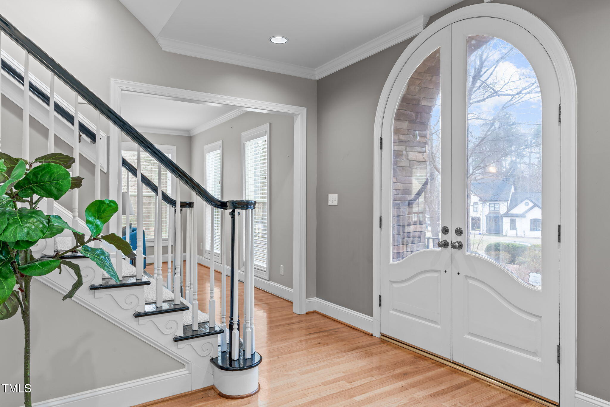 6016 Heatherstone Drive Raleigh, NC 27606 - Photo 4 of 40 a very nice looking room with wooden floor and windows