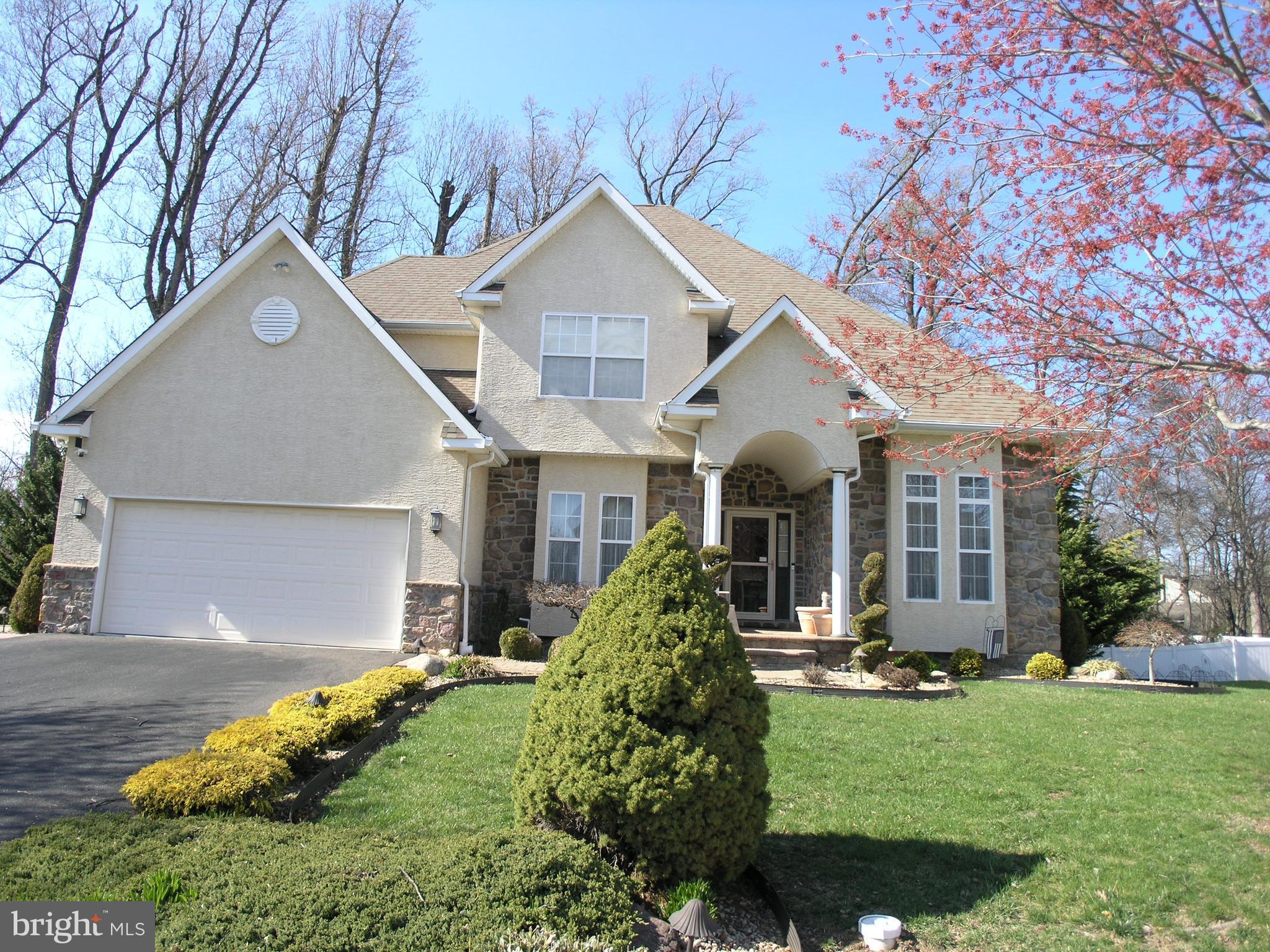 118 Casey Lane Bensalem, PA 19020 - Photo 1 of 26 a front view of a house with a yard