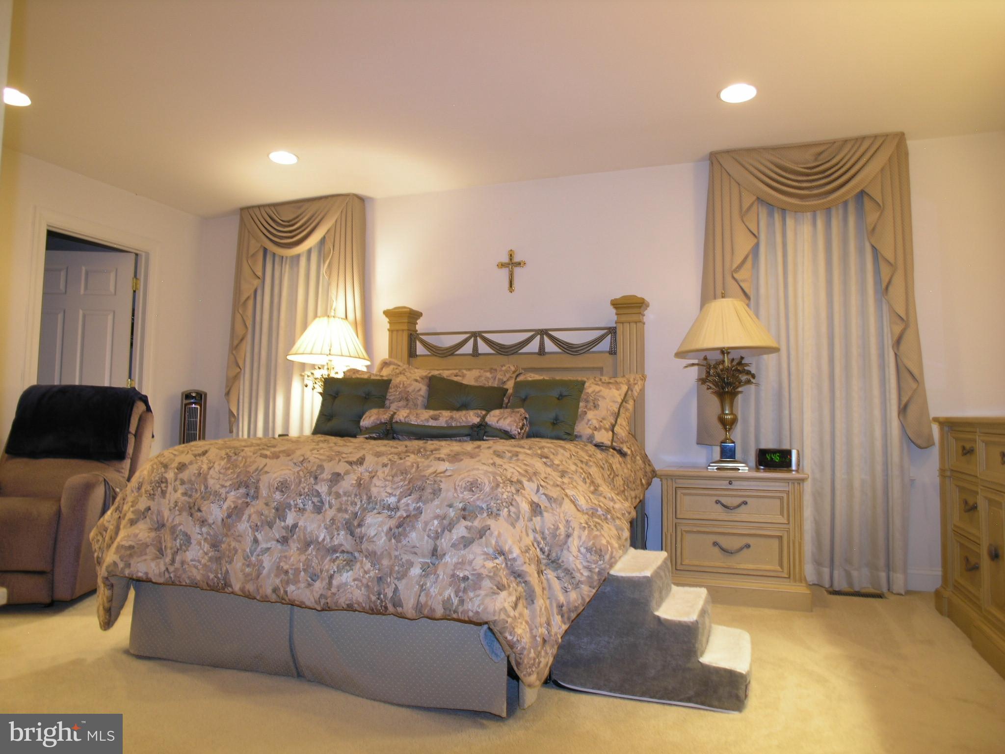 118 Casey Lane Bensalem, PA 19020 - Photo 16 of 26 a bedroom with a bed and a night stand