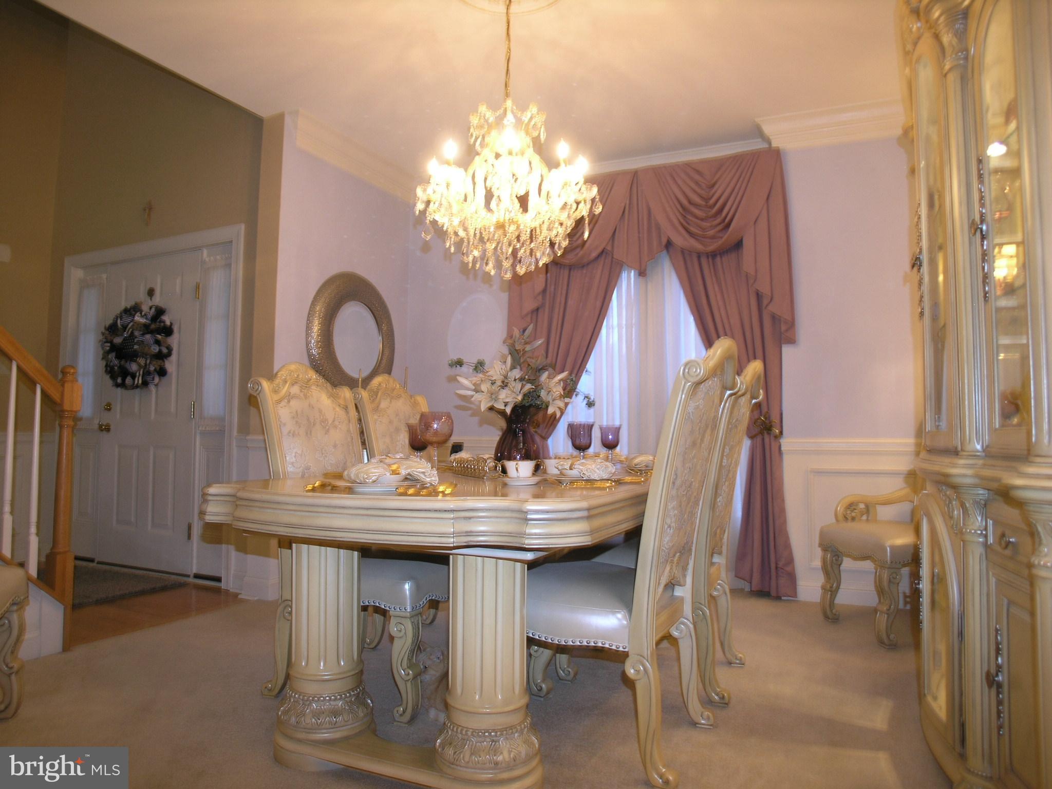 118 Casey Lane Bensalem, PA 19020 - Photo 6 of 26 a view of a dining room with furniture and chandelier