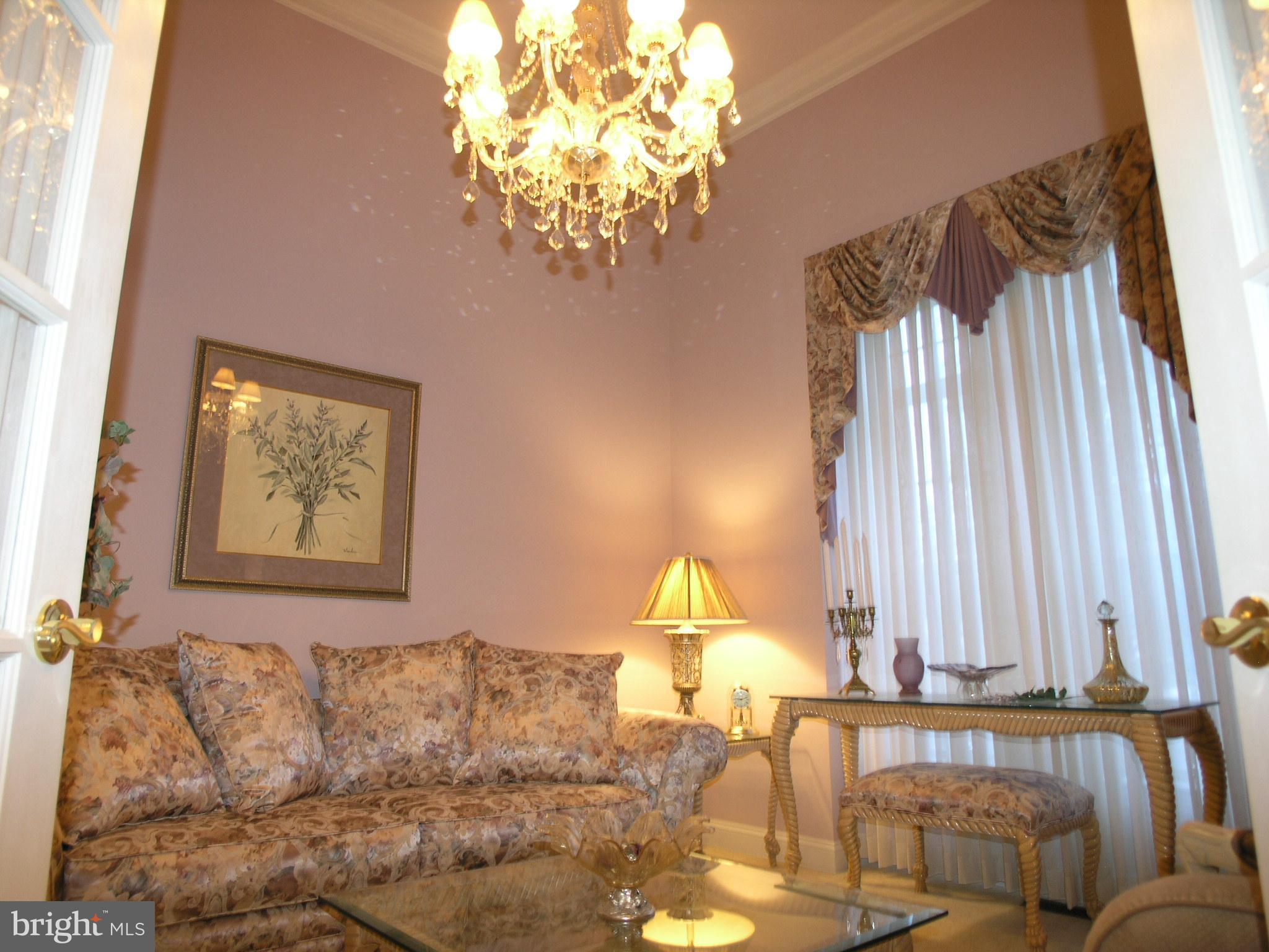 118 Casey Lane Bensalem, PA 19020 - Photo 8 of 26 a living room with furniture and a large window