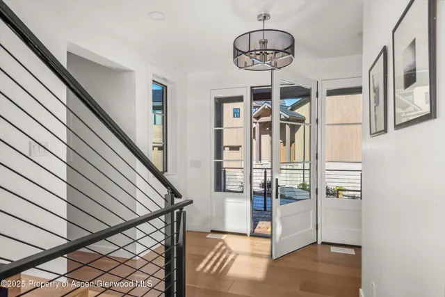 a outdoor living space with patio furniture and a fireplace