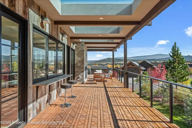 a view of a hallway with washer and dryer