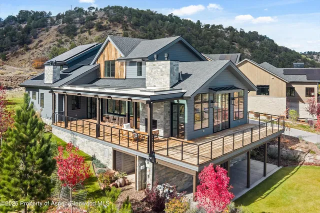 a view of a swimming pool and lounge chair