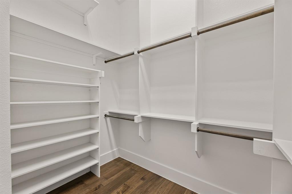 7854 Element Avenue Plano, TX 75024 - Photo 31 of 38 Spacious closet with dark wood-style flooring
