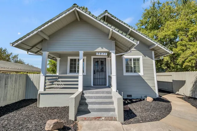 a front view of a house with a garage