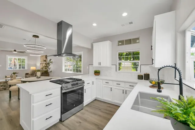 a bedroom with a bed and ceiling fan